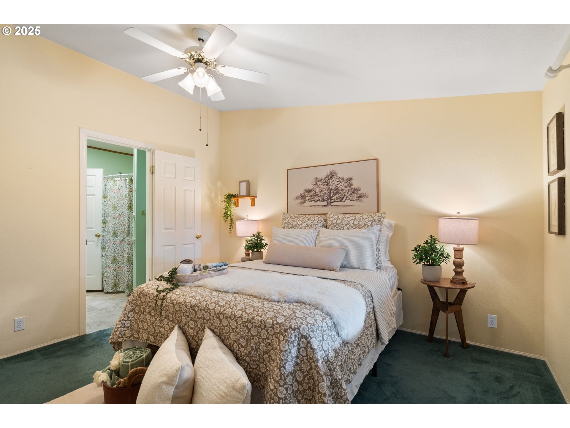 1720 Southwest Stringtown Road Forest Grove, OR 97116 - Photo 17 of 39 a bedroom with a bed and a chandelier
