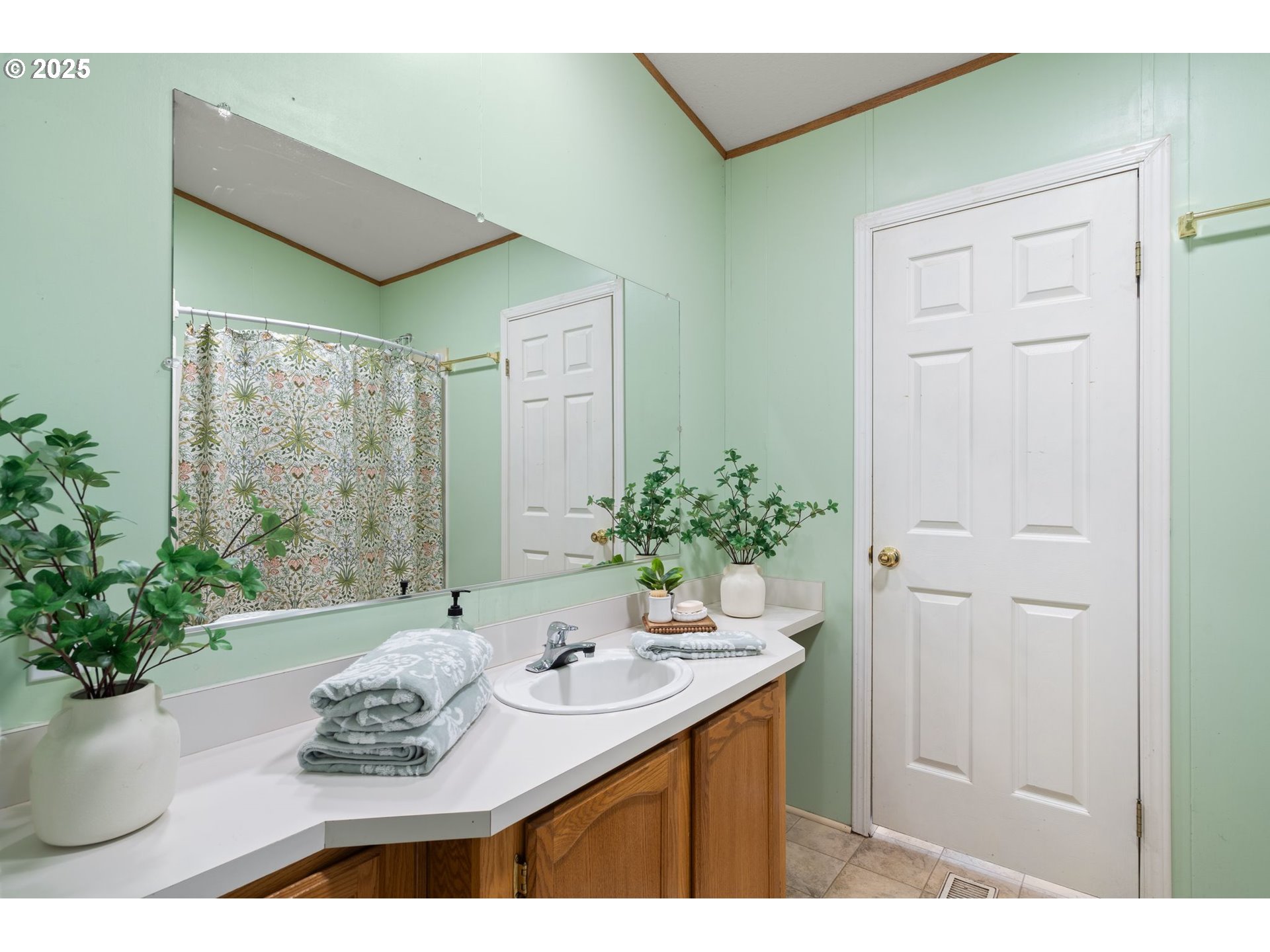 1720 Southwest Stringtown Road Forest Grove, OR 97116 - Photo 20 of 39 a bathroom with a sink and a mirror