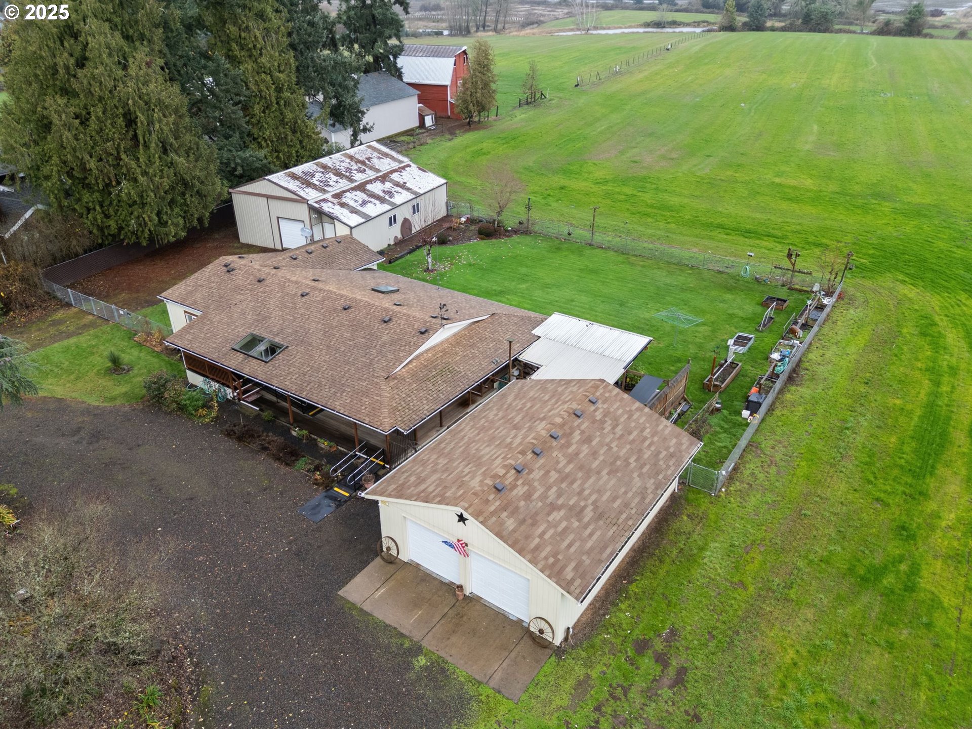 1720 Southwest Stringtown Road Forest Grove, OR 97116 - Photo 2 of 39 an aerial view of a house with a yard