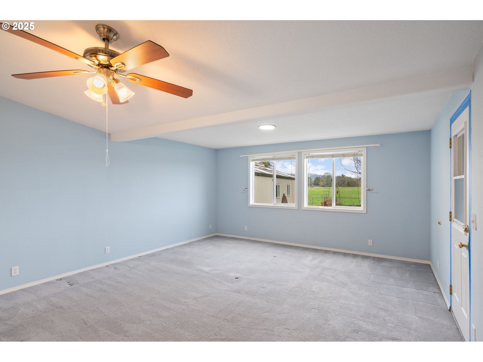 1720 Southwest Stringtown Road Forest Grove, OR 97116 - Photo 22 of 39 a view of an empty room with a window