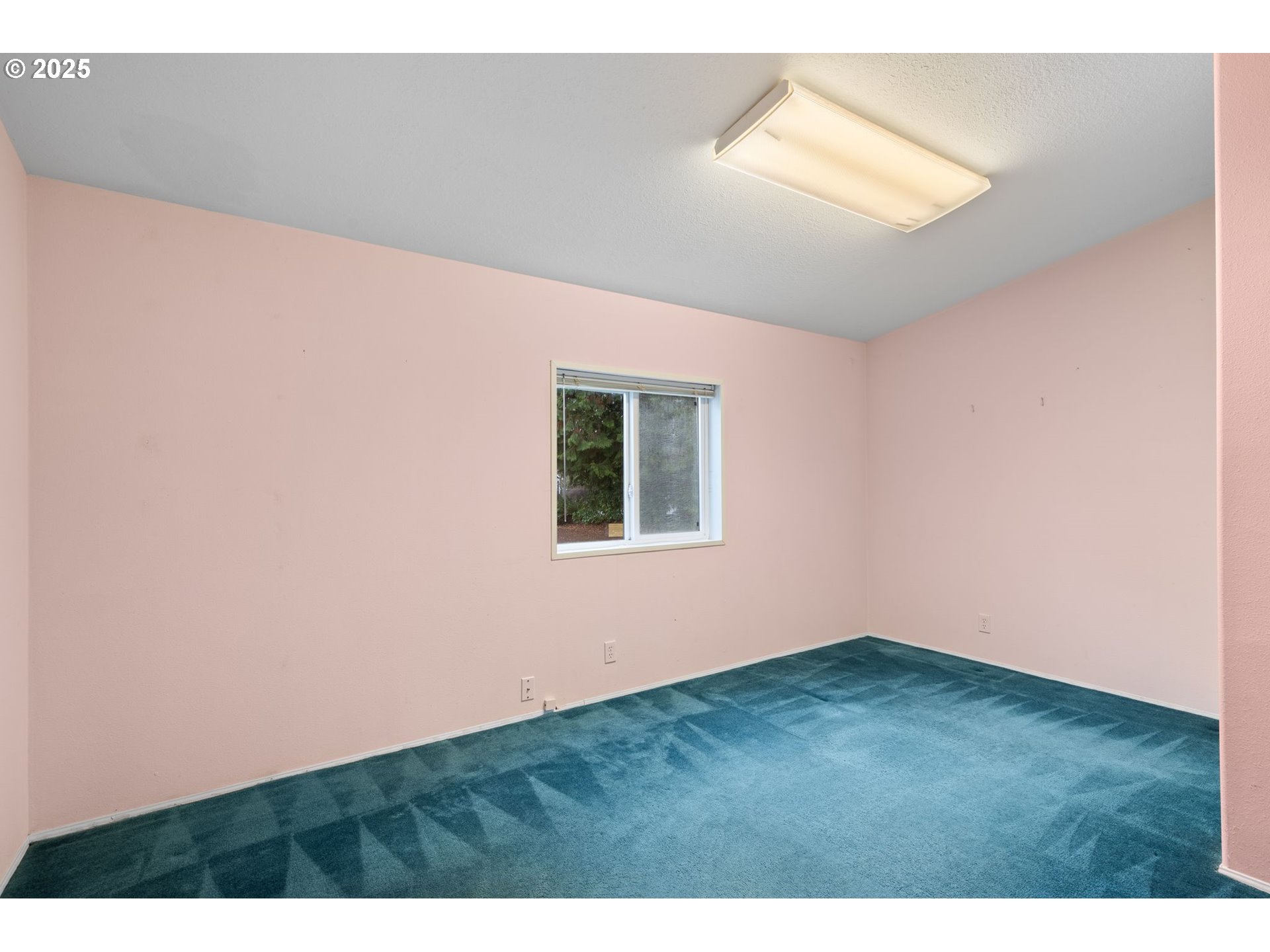 1720 Southwest Stringtown Road Forest Grove, OR 97116 - Photo 25 of 39 a view of an empty room with a window