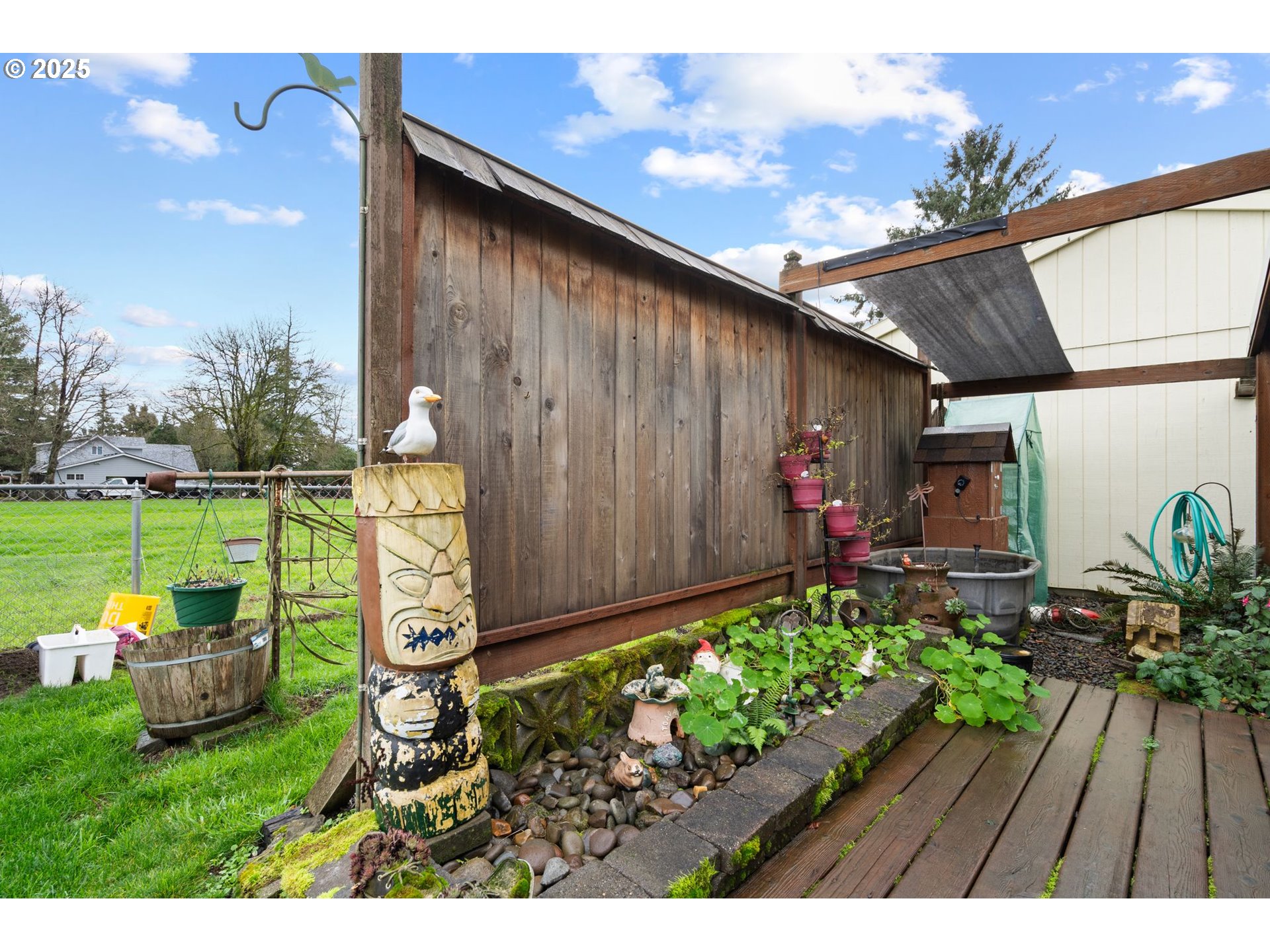 1720 Southwest Stringtown Road Forest Grove, OR 97116 - Photo 30 of 39 a view of backyard with sitting space