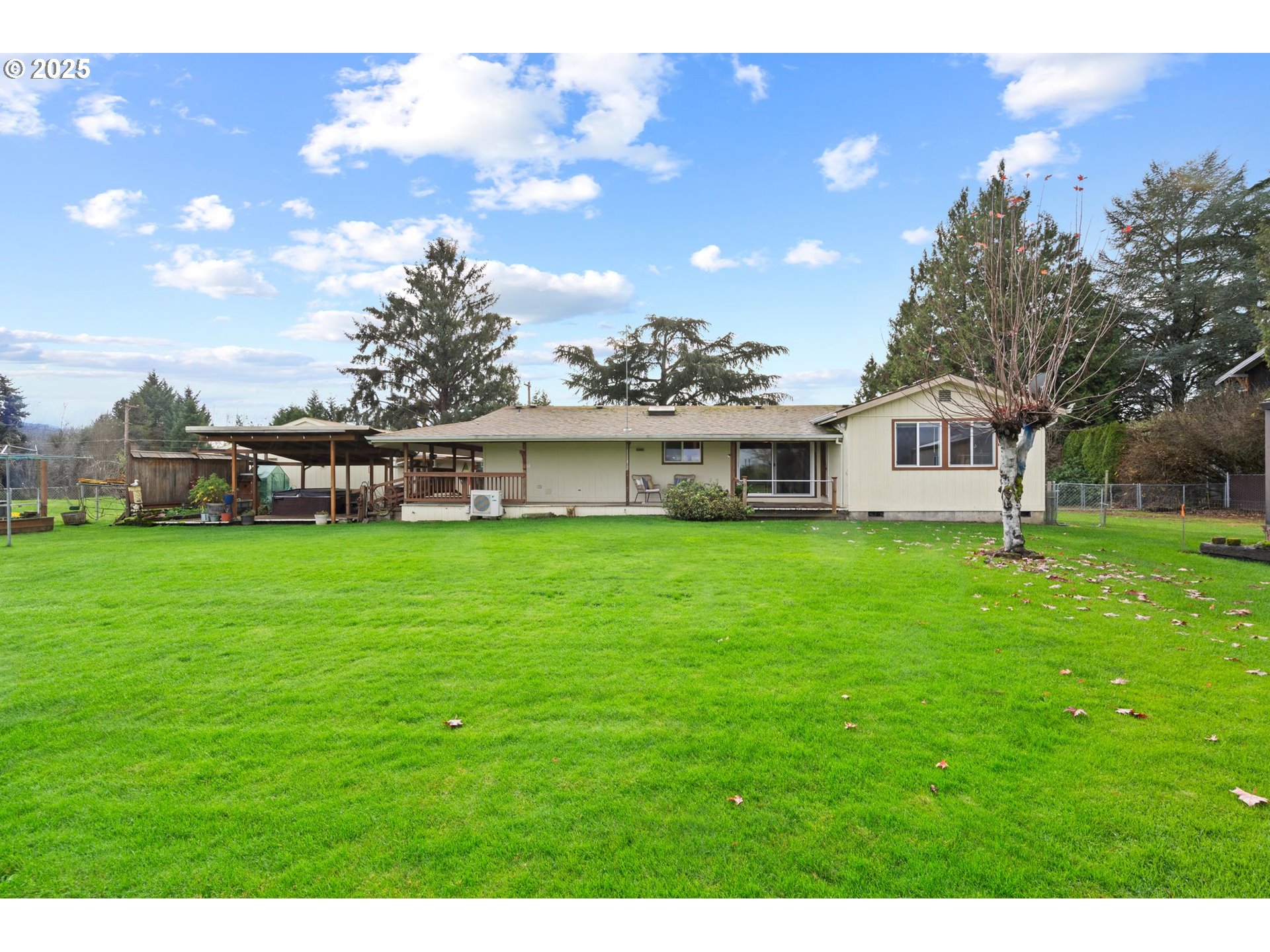 1720 Southwest Stringtown Road Forest Grove, OR 97116 - Photo 4 of 39 a view of an house with backyard space and balcony