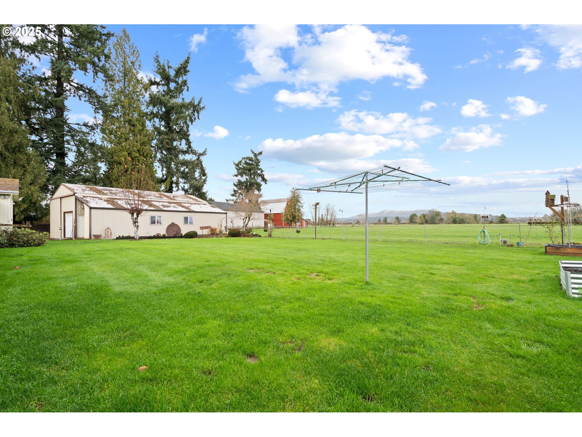 1720 Southwest Stringtown Road Forest Grove, OR 97116 - Photo 5 of 39 a view of an house with backyard and garden