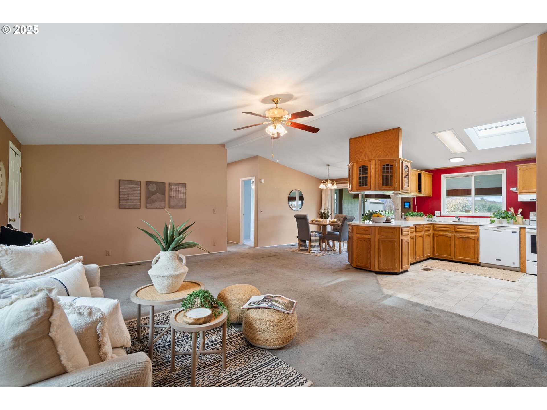 1720 Southwest Stringtown Road Forest Grove, OR 97116 - Photo 9 of 39 a living room with furniture and kitchen view