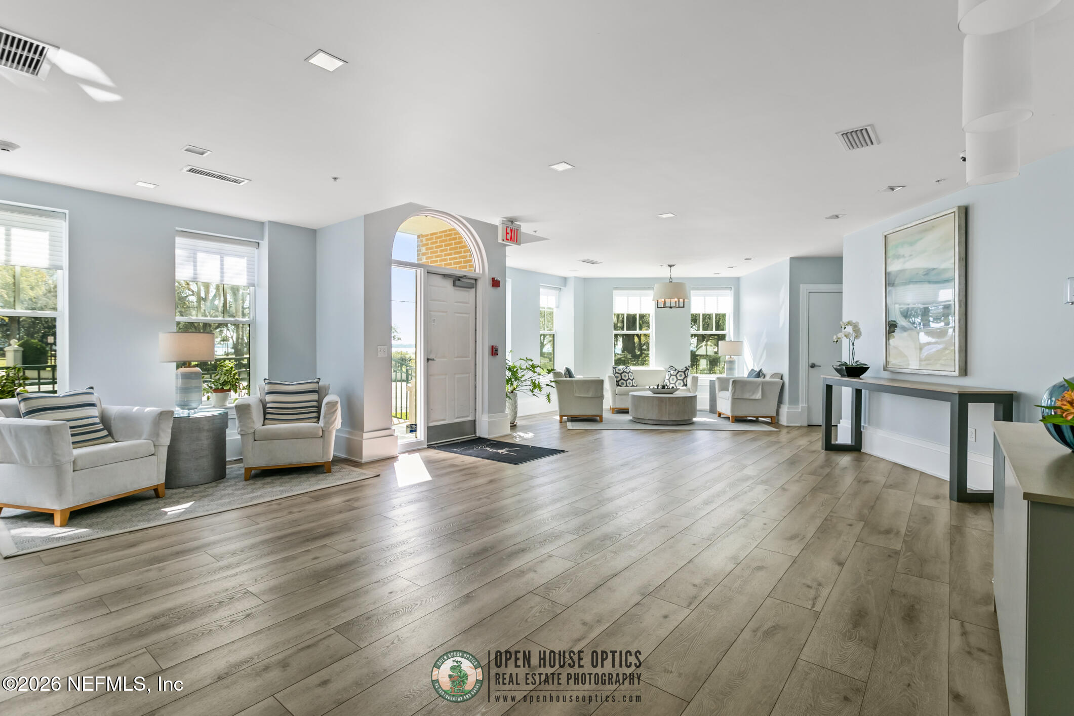 1661 Riverside Avenue, Unit 407 Jacksonville, FL 32204 - Photo 45 of 60 a living room with furniture and a wooden floor