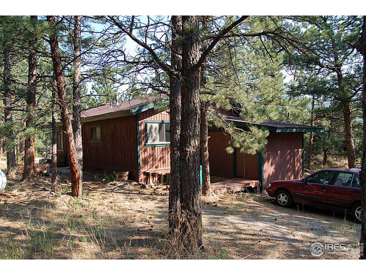73 Sioux Road Lyons, CO 80540 - Photo 10 of 11 a view of a couches under an umbrella