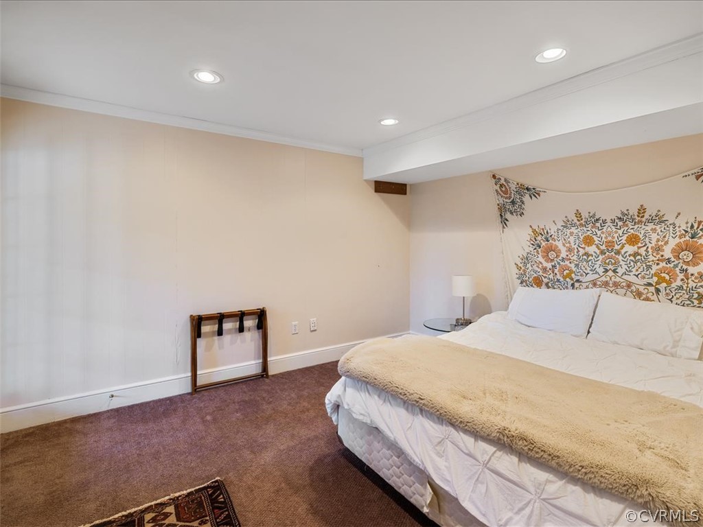 10231 Apache Road Richmond, VA 23235 - Photo 29 of 37 a bedroom with a bed and a painting