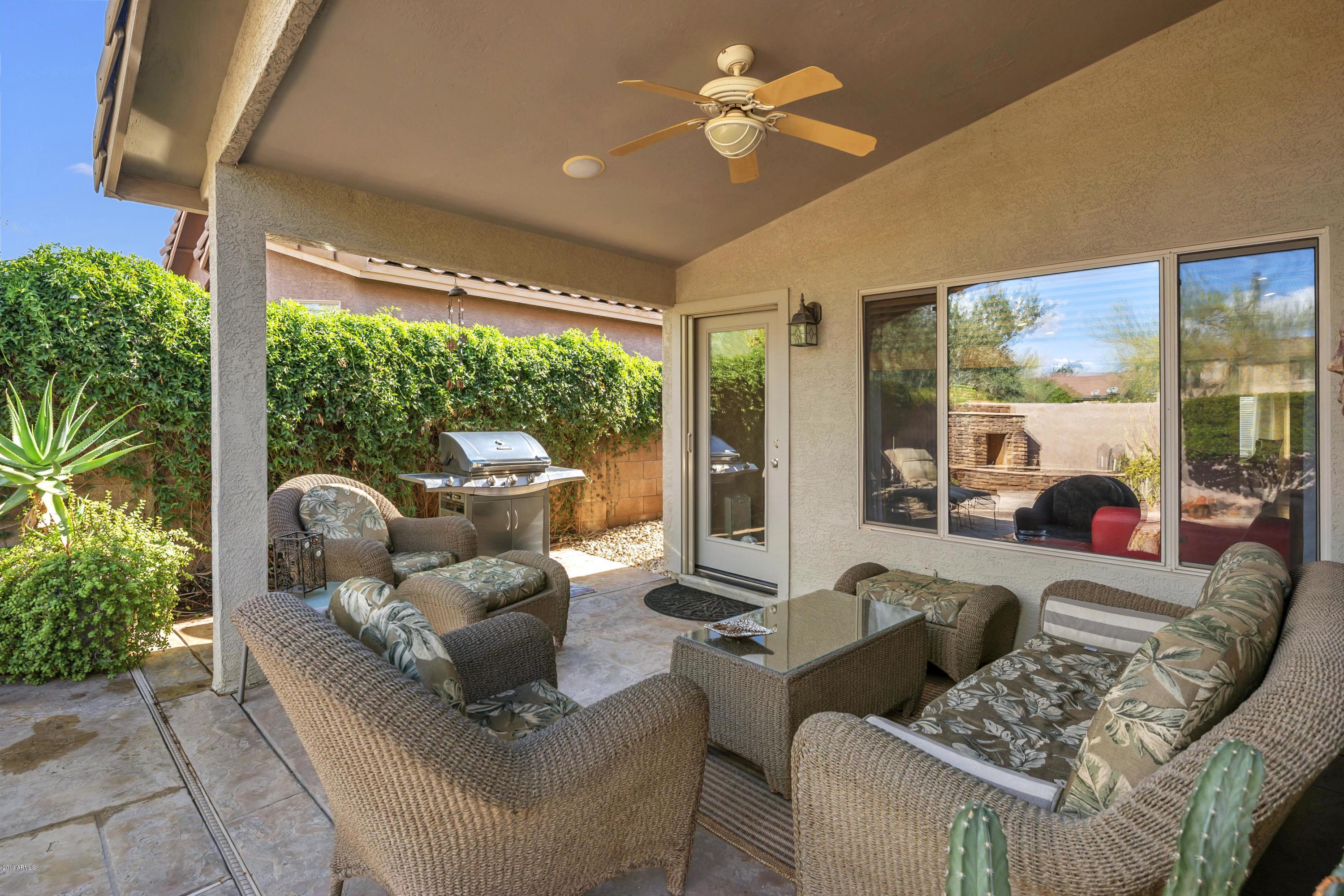 4422 East Rowel Road Phoenix, AZ 85050 - Photo 20 of 24 a living room with furniture and a large window