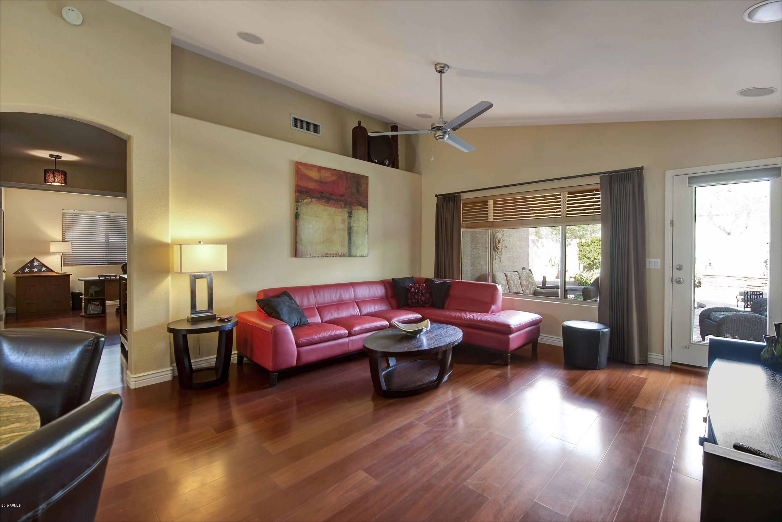 4422 East Rowel Road Phoenix, AZ 85050 - Photo 10 of 24 a living room with furniture window and wooden floor