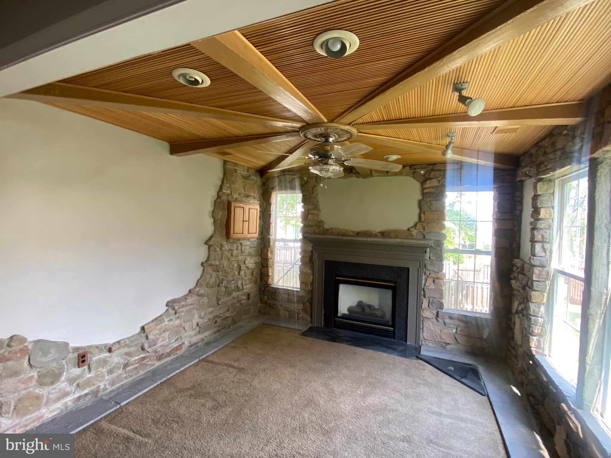 19958 Fieldgrass Square Ashburn, VA 20147 - Photo 12 of 14 a view of a livingroom with a fireplace