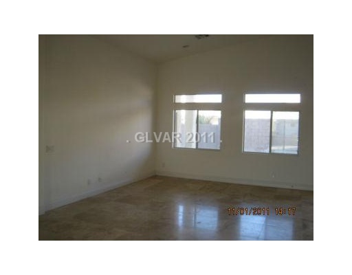 8608 Blackhawk Ranch Street Las Vegas, NV 89123 - Photo 3 of 10 Living Room.