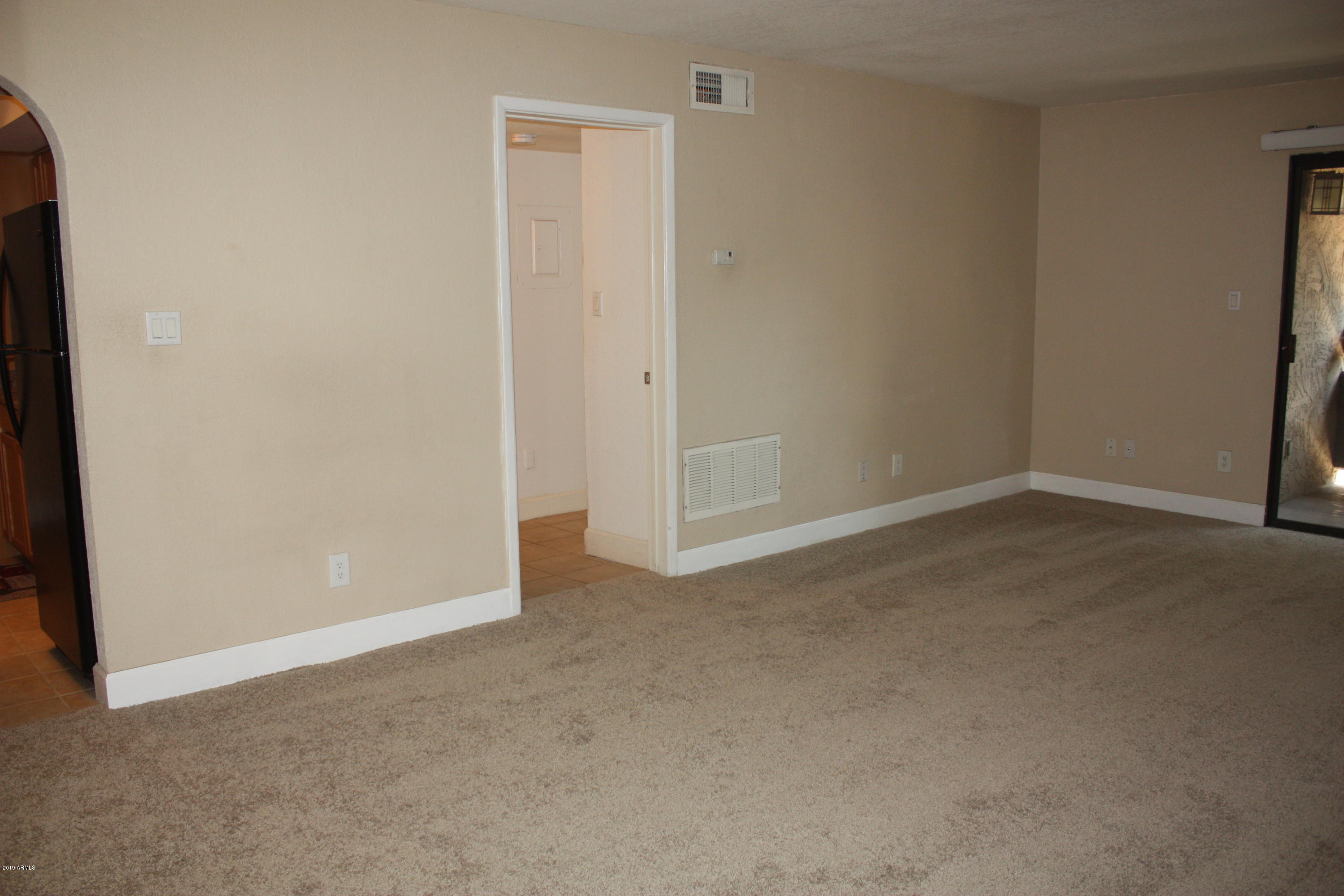 3825 East Camelback Road, Unit 281 Phoenix, AZ 85018 - Photo 8 of 19 living room 2