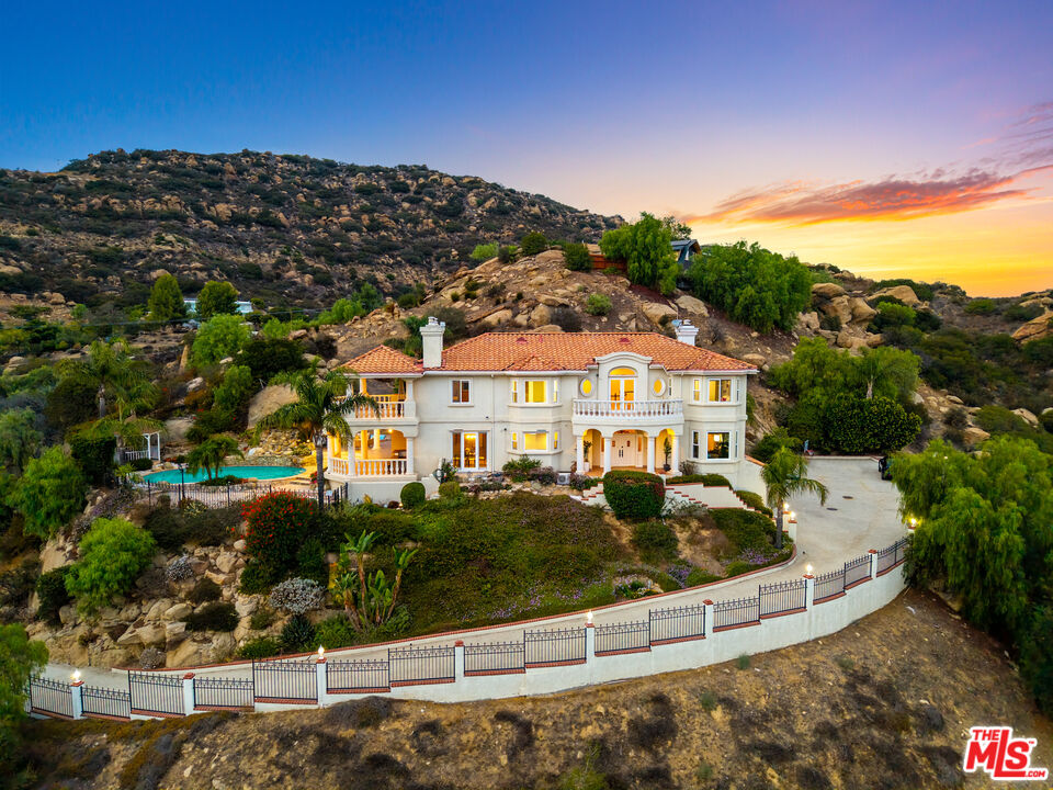7449 Studio Road West Hills, CA 91304 - Photo 2 of 33 a view of multiple houses with a yard