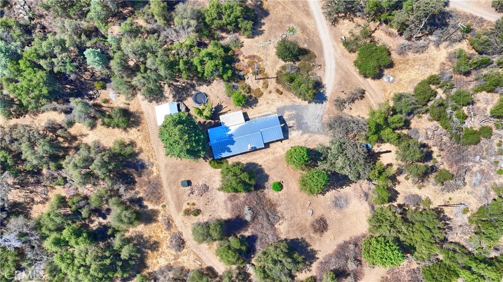 5268 Schafer Road Mariposa, CA 95338 - Photo 41 of 45 an aerial view of a house with a yard and garden