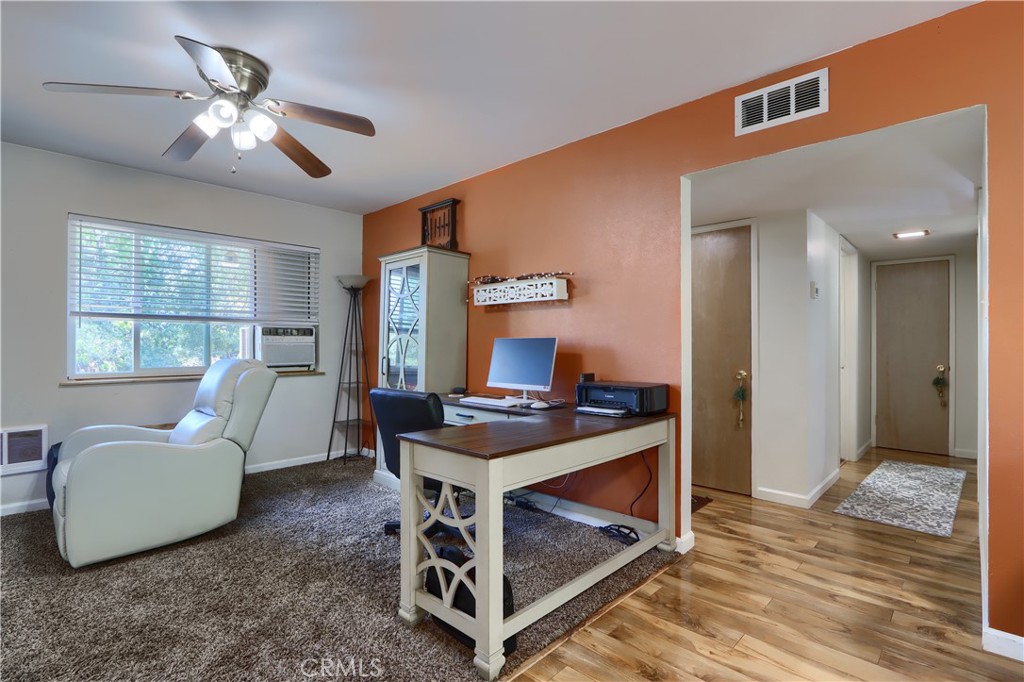 5268 Schafer Road Mariposa, CA 95338 - Photo 10 of 45 a living room with furniture and a chandelier