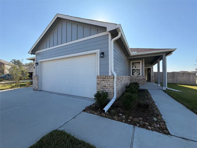 a house view with a backyard space