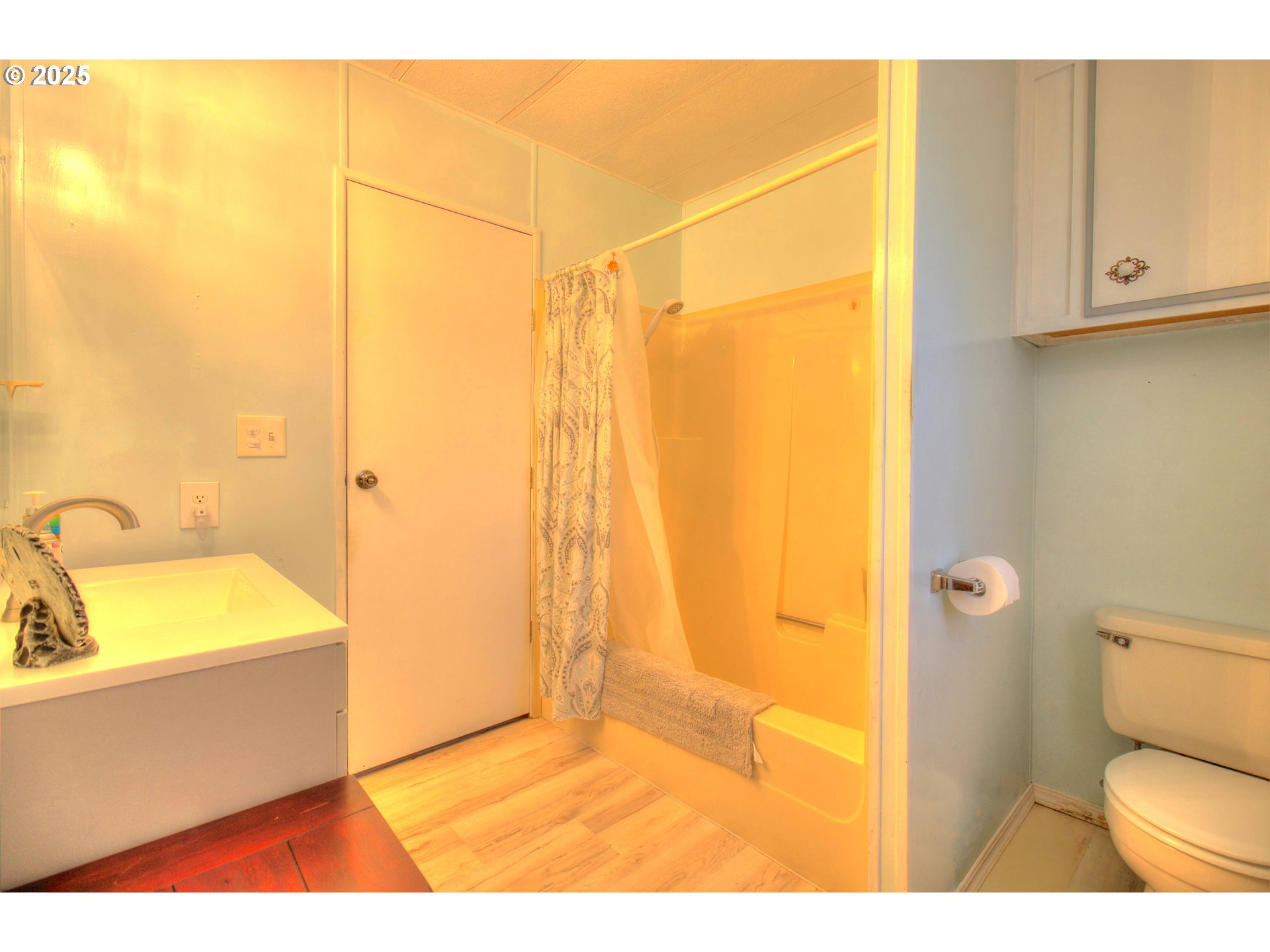 1109 Rowland Lane Brookings, OR 97415 - Photo 10 of 21 a bathroom with a sink toilet and shower
