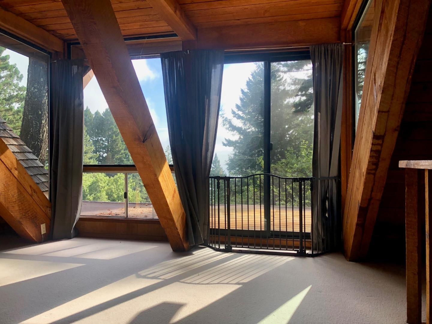 87 Upenuf Road Woodside, CA 94062 - Photo 14 of 42 a view of an empty room with windows