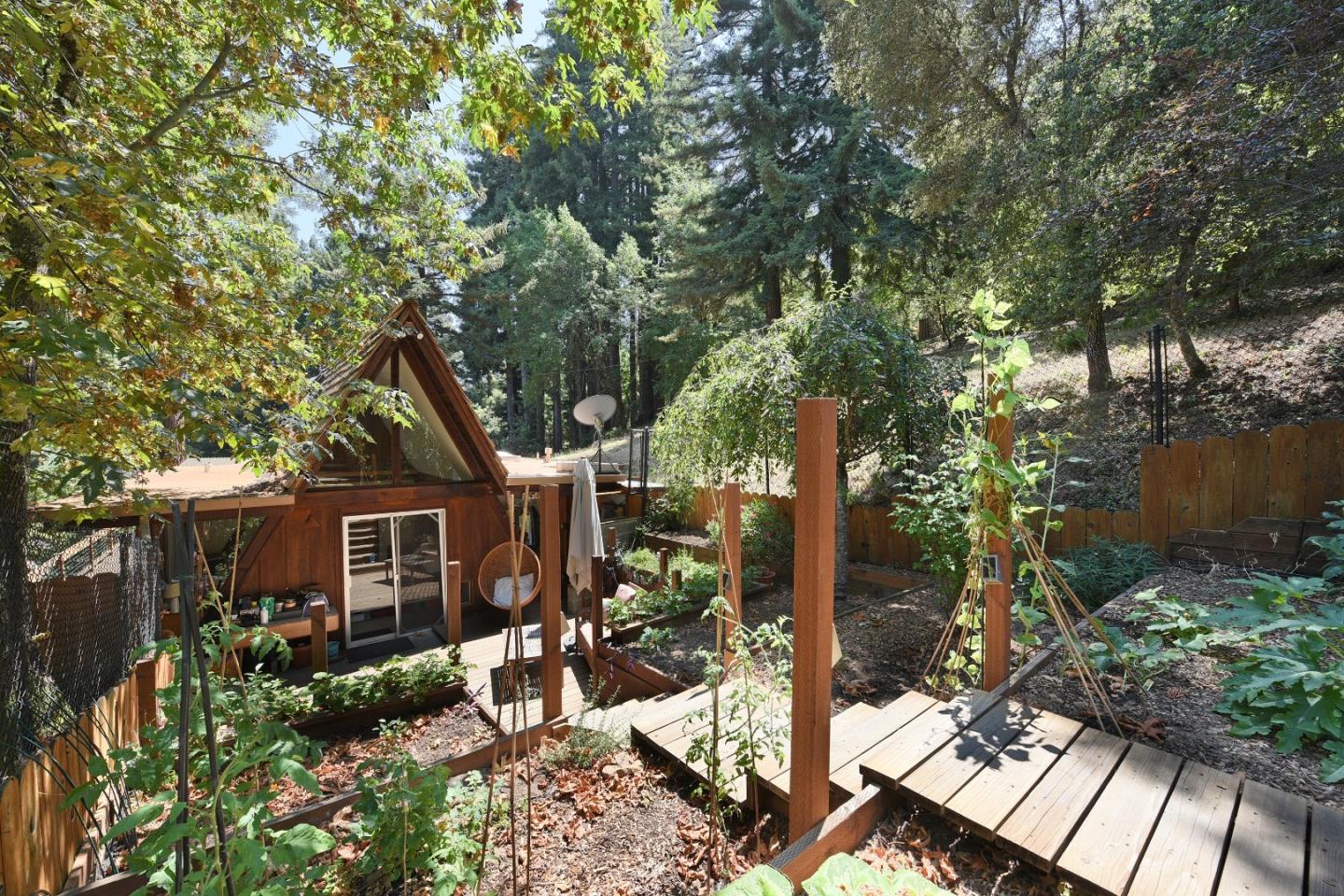 87 Upenuf Road Woodside, CA 94062 - Photo 17 of 42 a view of a house with yard and sitting area