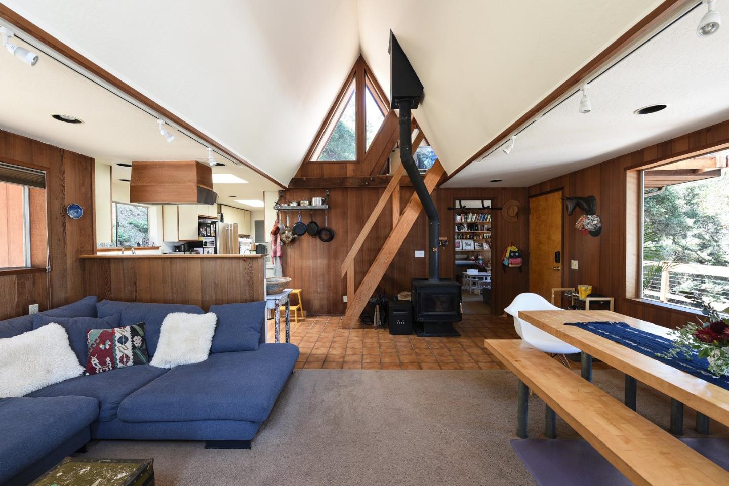 87 Upenuf Road Woodside, CA 94062 - Photo 19 of 42 a living room with furniture and a floor to ceiling window