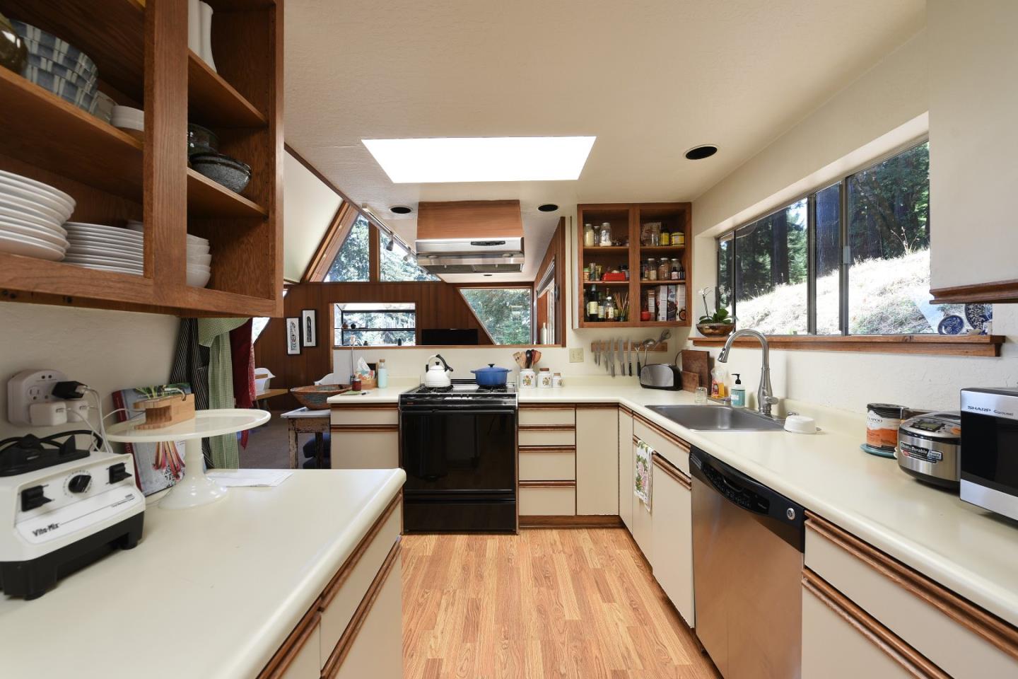 87 Upenuf Road Woodside, CA 94062 - Photo 21 of 42 a kitchen with lots of counter top space and stove top oven