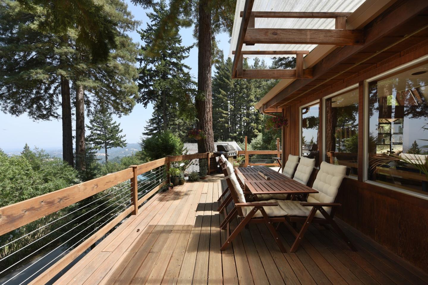 87 Upenuf Road Woodside, CA 94062 - Photo 26 of 42 a view of deck with furniture and trees