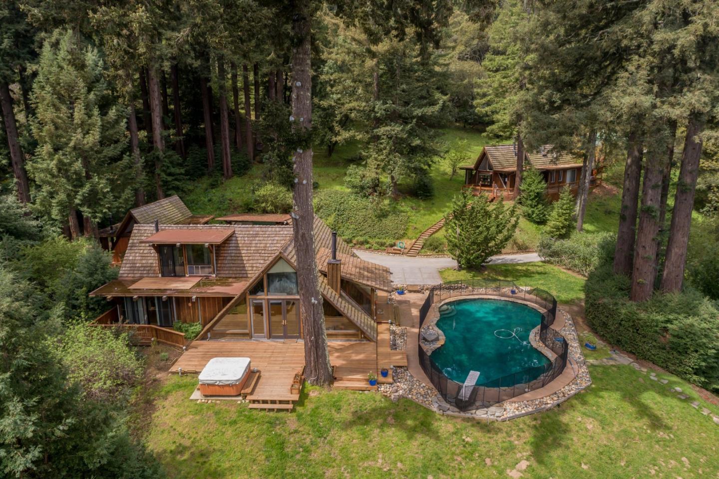 87 Upenuf Road Woodside, CA 94062 - Photo 38 of 42 an aerial view of a house with swimming pool and trees
