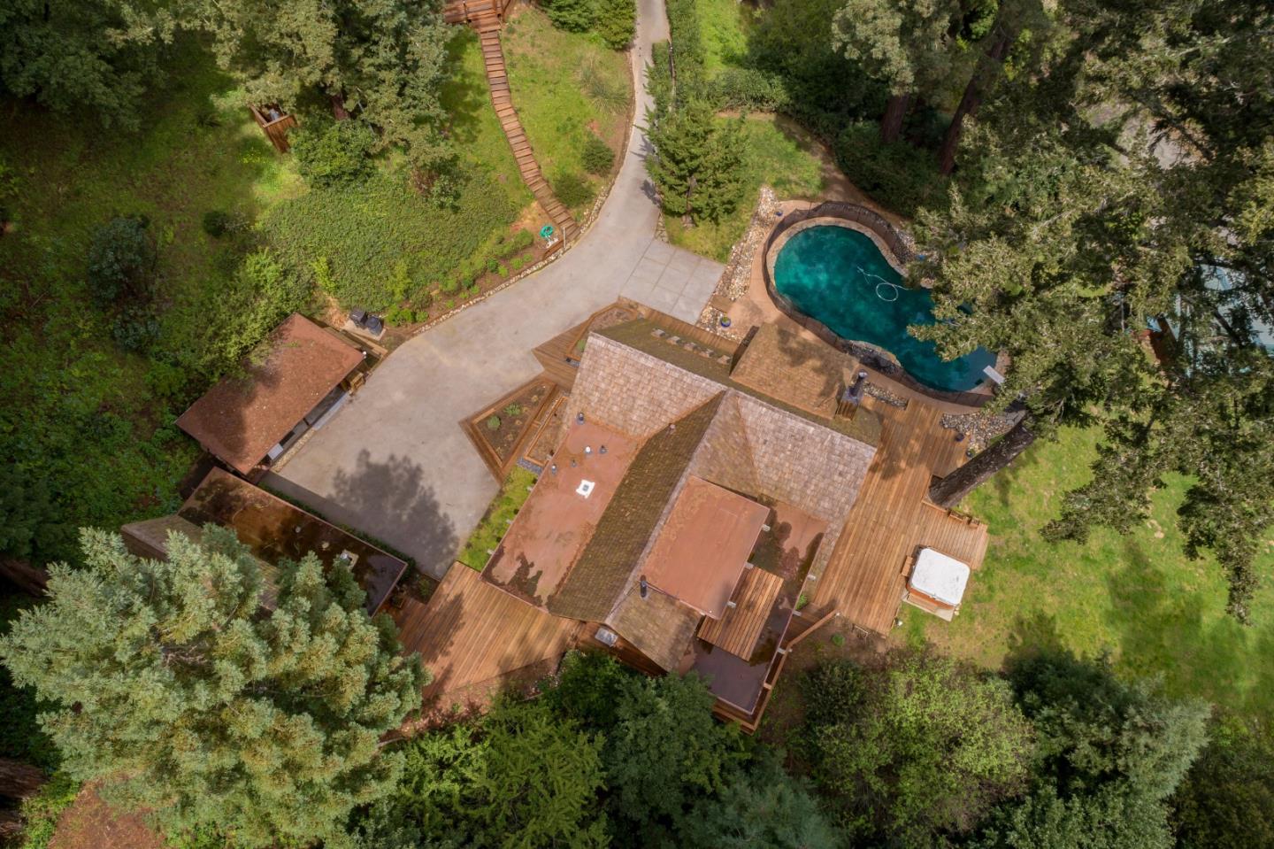87 Upenuf Road Woodside, CA 94062 - Photo 40 of 42 an aerial view of a house with a yard and lake view