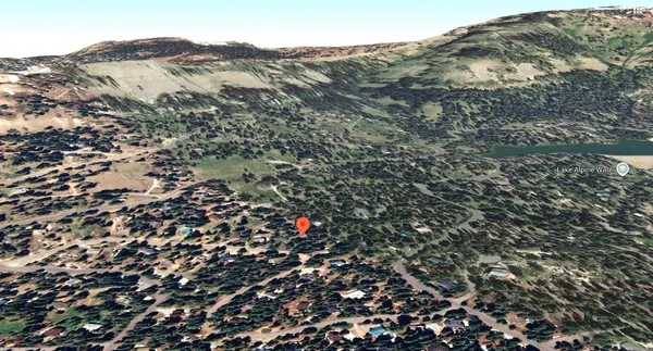 a view of a lake with a mountain in the background