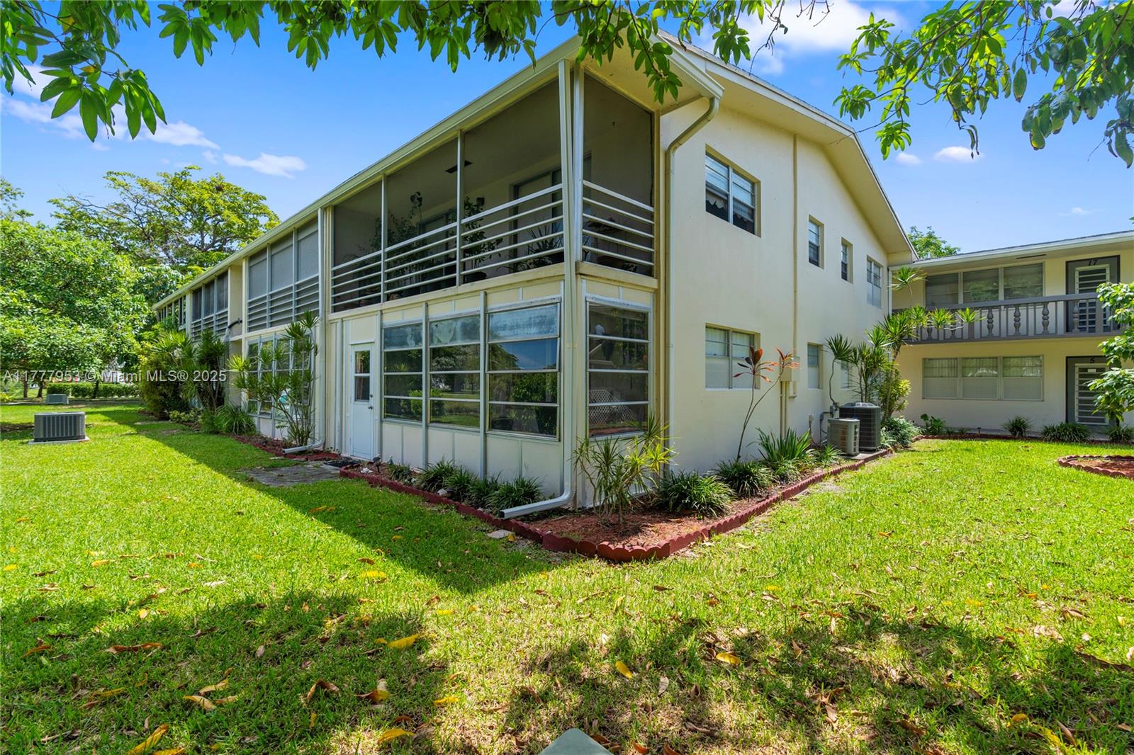 4 Markham A, Unit 4 Deerfield Beach, FL 33442 - Photo 22 of 23 a view of a house with backyard