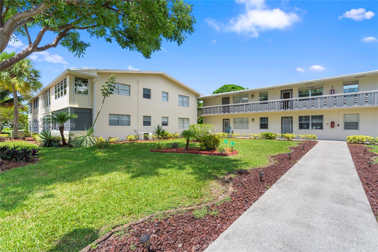 4 Markham A, Unit 4 Deerfield Beach, FL 33442 - Photo 23 of 23 a view of house with yard