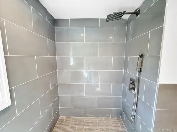 a bathroom with a glass shower