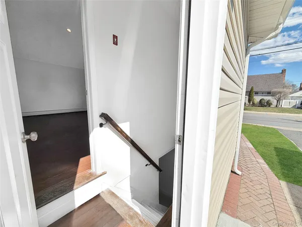 a view of a stairs and an entryway