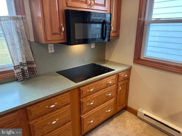 1033 Martindale Road Ephrata, PA 17522 - Photo 11 of 32 a kitchen with granite countertop cabinets and oven