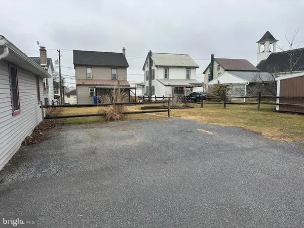 a view of house with outdoor space