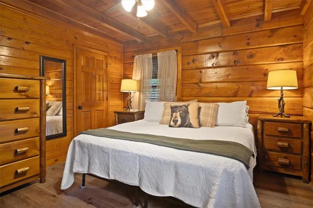 a bedroom with a bed and a closet