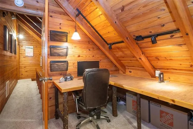 a view of balcony with table and chairs