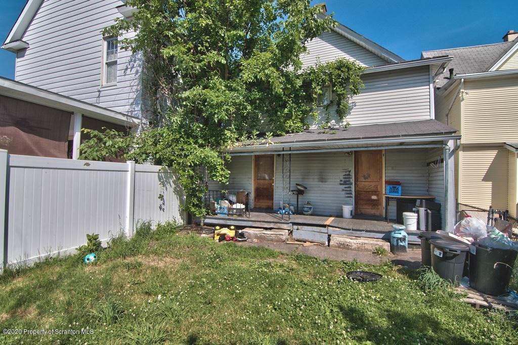 1716 Wayne Avenue Scranton, PA 18508 - Photo 14 of 42 a front view of a house with sitting area