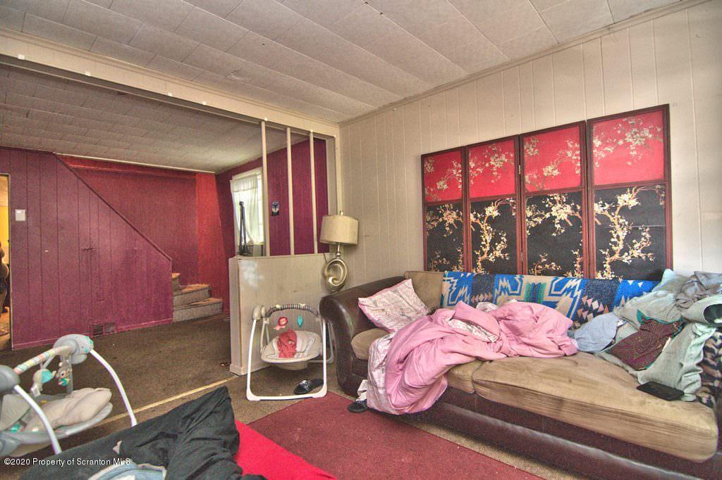 1716 Wayne Avenue Scranton, PA 18508 - Photo 16 of 42 a bedroom with bed and window