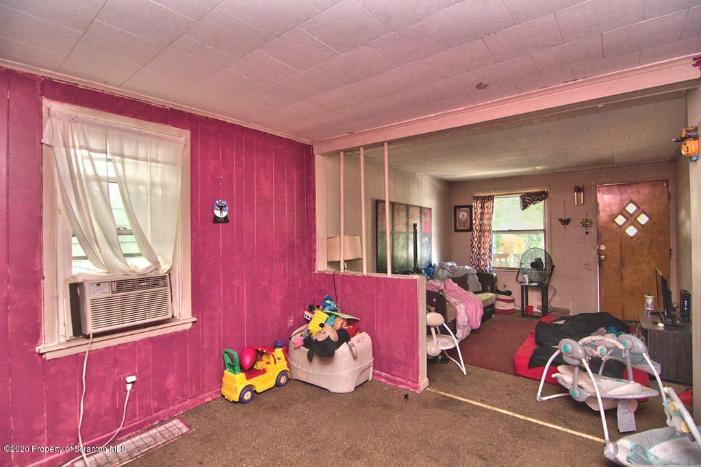 1716 Wayne Avenue Scranton, PA 18508 - Photo 19 of 42 a bedroom with furniture and windows