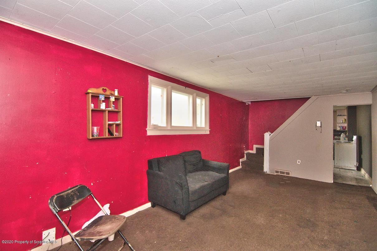 1716 Wayne Avenue Scranton, PA 18508 - Photo 29 of 42 a living room with furniture and a window