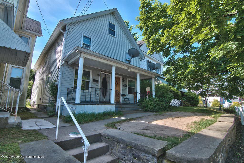 1716 Wayne Avenue Scranton, PA 18508 - Photo 3 of 42 a front view of a house with a porch