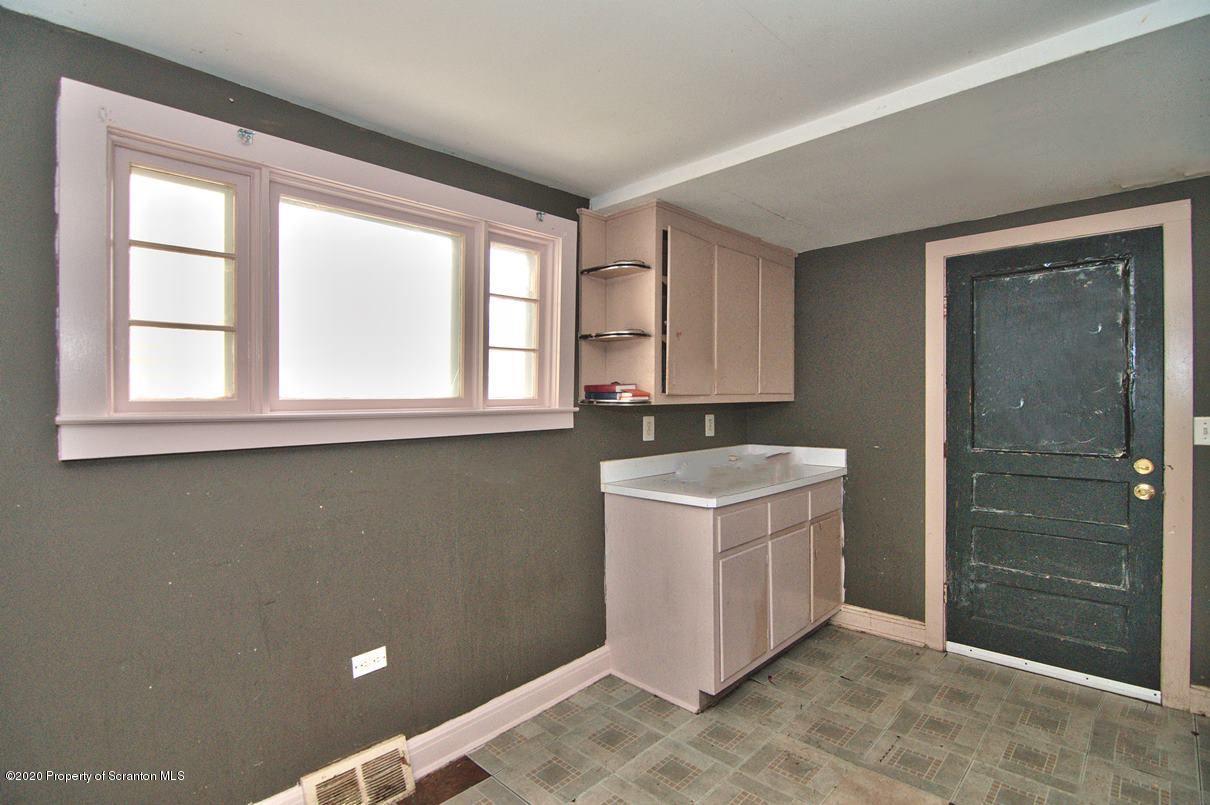 1716 Wayne Avenue Scranton, PA 18508 - Photo 32 of 42 an empty room with a sink and a window