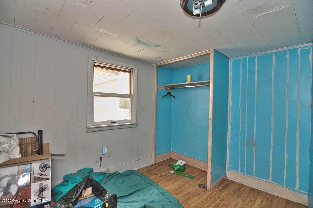 1716 Wayne Avenue Scranton, PA 18508 - Photo 39 of 42 a bedroom with a bed and a window
