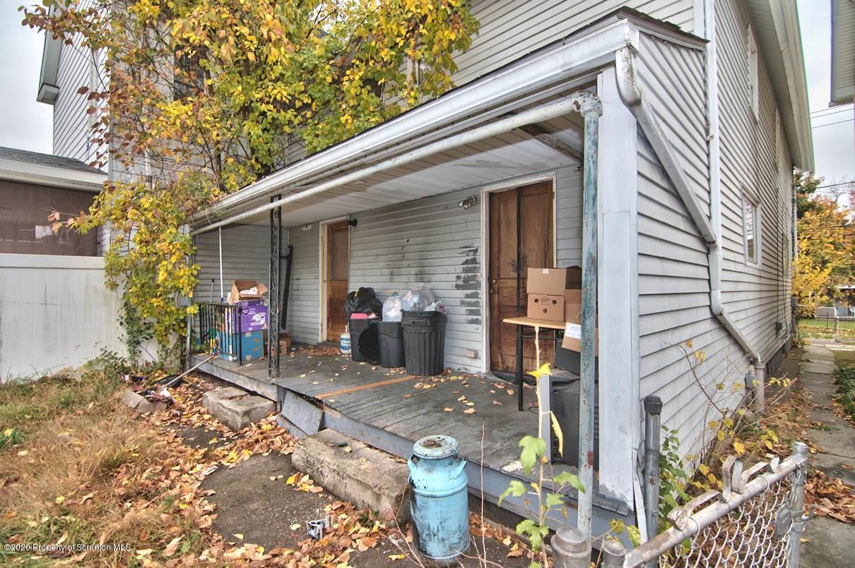 1716 Wayne Avenue Scranton, PA 18508 - Photo 9 of 42 a view of a patio with table and chairs and potted plants