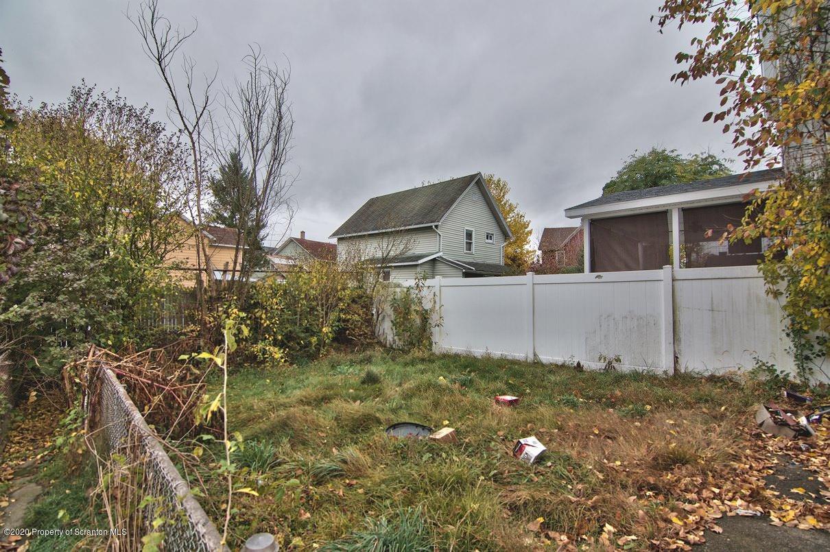 1716 Wayne Avenue Scranton, PA 18508 - Photo 10 of 42 a view of a house with a yard