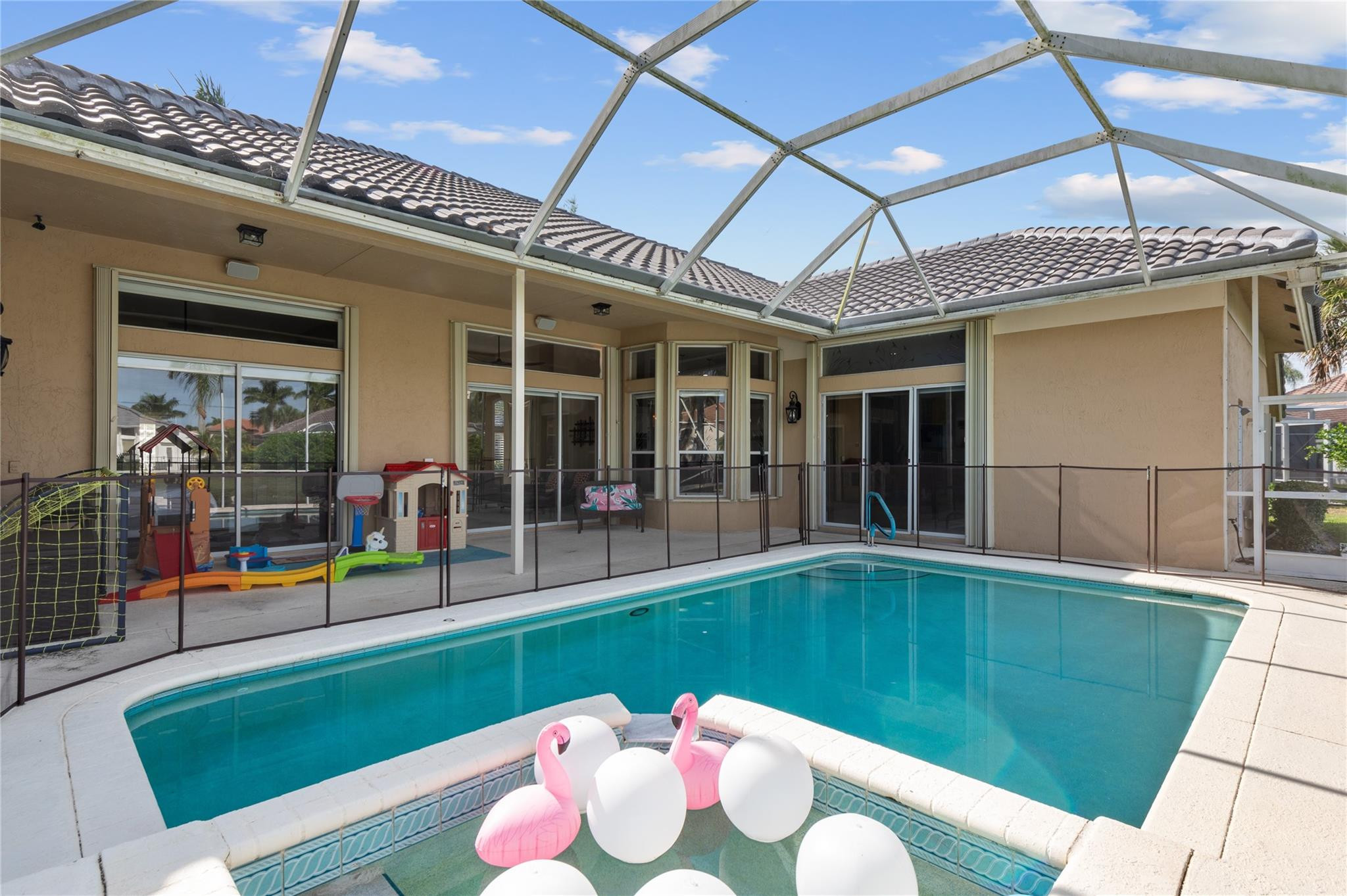 20220 Ocean Key Drive Boca Raton, FL 33498 - Photo 34 of 43 a view of a swimming pool with an outdoor seating