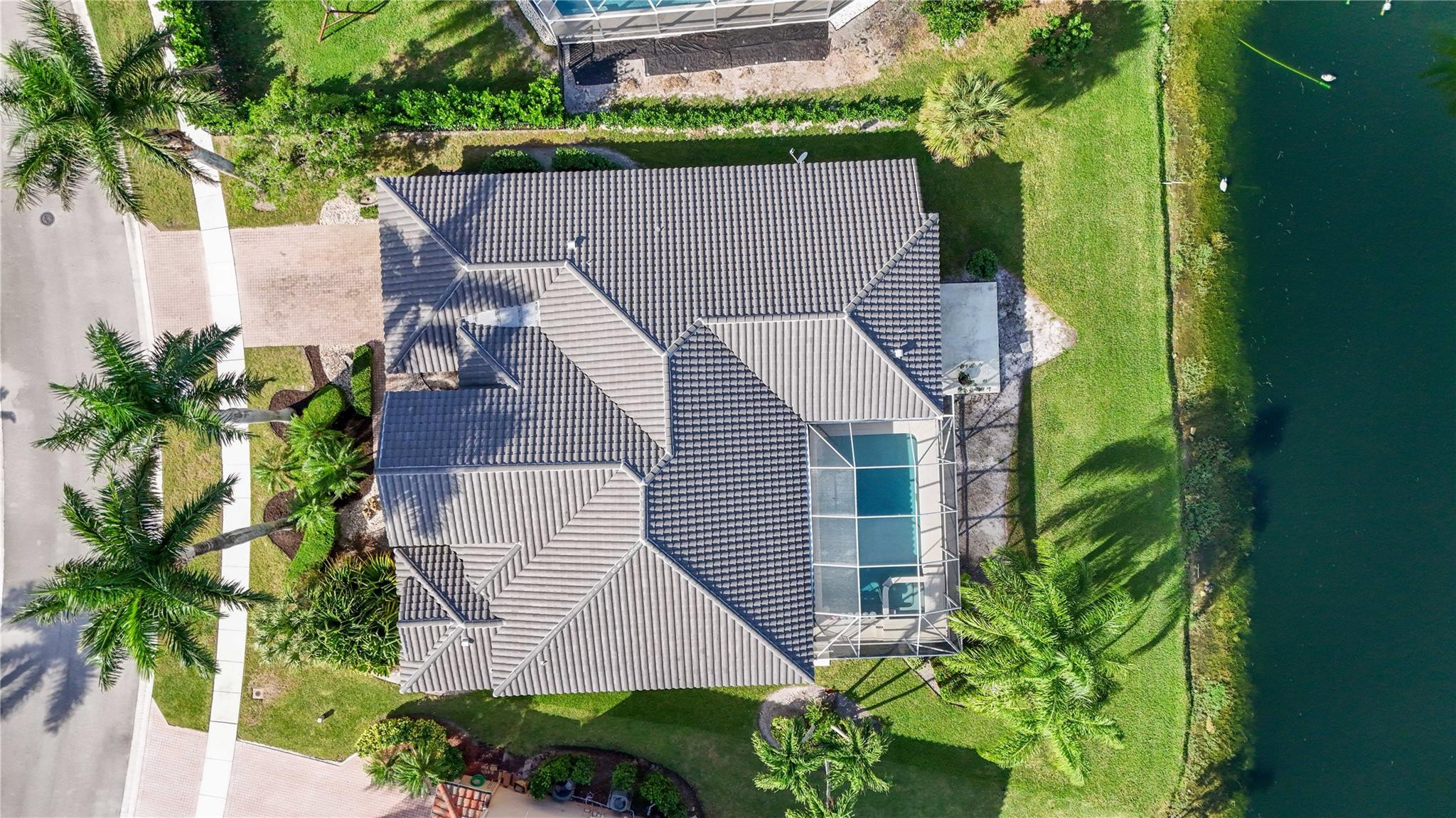 20220 Ocean Key Drive Boca Raton, FL 33498 - Photo 42 of 43 an aerial view of a house with a yard and potted plants