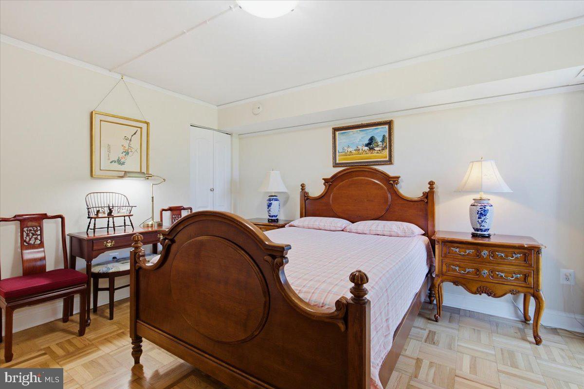 700 7th Street Southwest, Unit 827 Washington, DC 20024 - Photo 13 of 32 Charming bedroom with classic elegance.